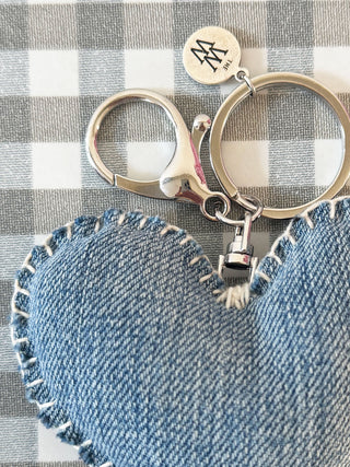 Close-up of heart keyring crafted from vintage denim – eco-conscious gift idea