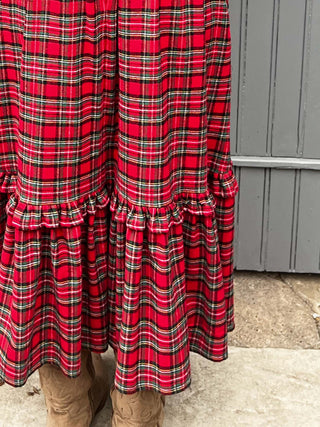 women wearing red tartan dress detail