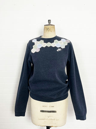 upcycled sweatshirt on mannequin