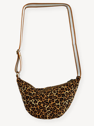Leopard print bag with a brown strap on a white background