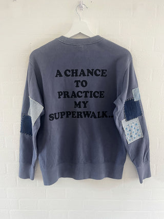 upcycled snoopy sweatshirt on hanger back