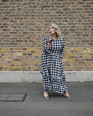 women wearing black and white dress