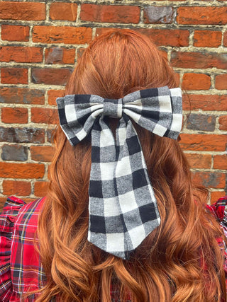 women wearing gingham hair bow