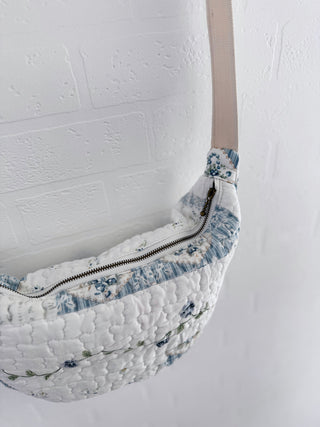 quilted bag on hanging on wall zip
