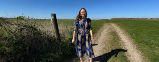 women wearing bold animal print cotton dress made by the well worn