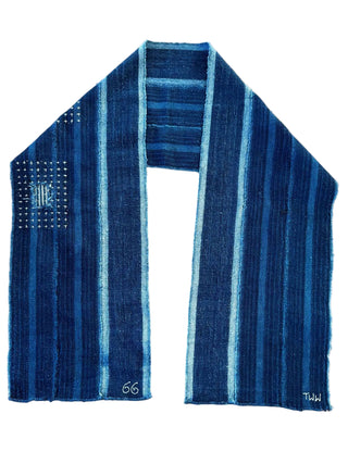 Blue striped fabric on a wooden surface
