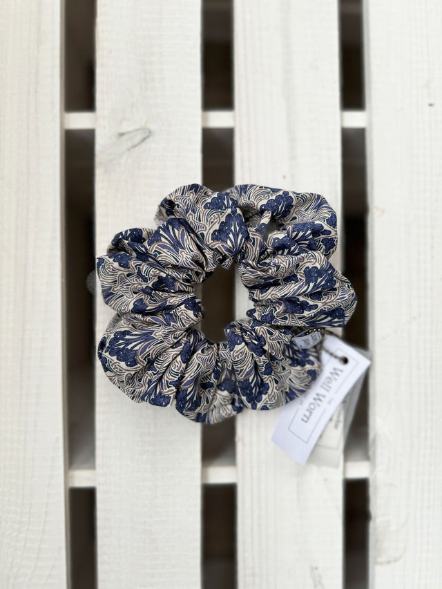The Well Worn blue scrunchie on white background