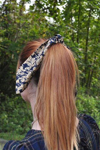women wearing printed hair tie