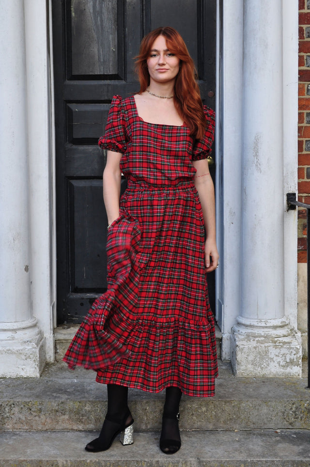 women wearing tartan top