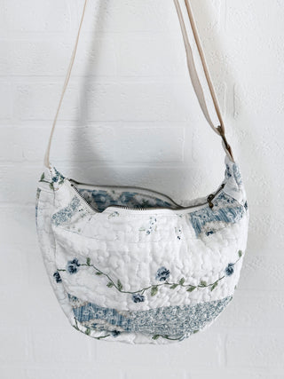 quilted bag on hanging on wall