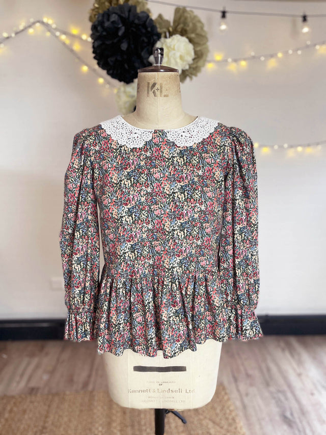 The Well Worn front view floral top on mannequin