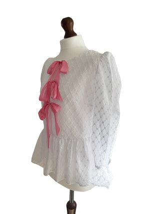 Close-up of gathered sleeve and peplum hem on The Bethany Top in deadstock cotton