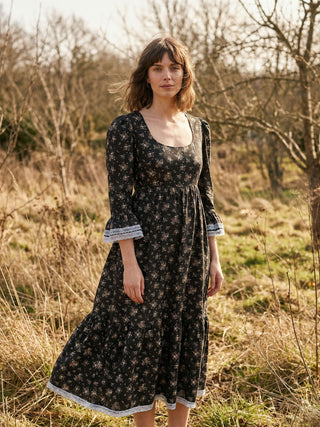 woman in lace trim floral dress
