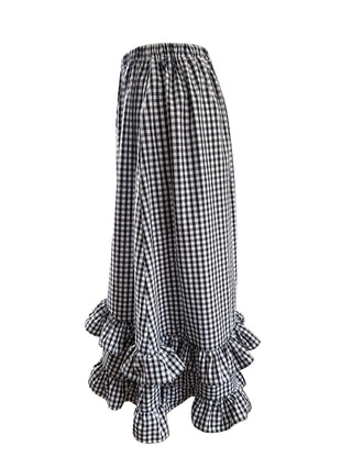 Black and white checkered skirt with ruffled bottom on a white background