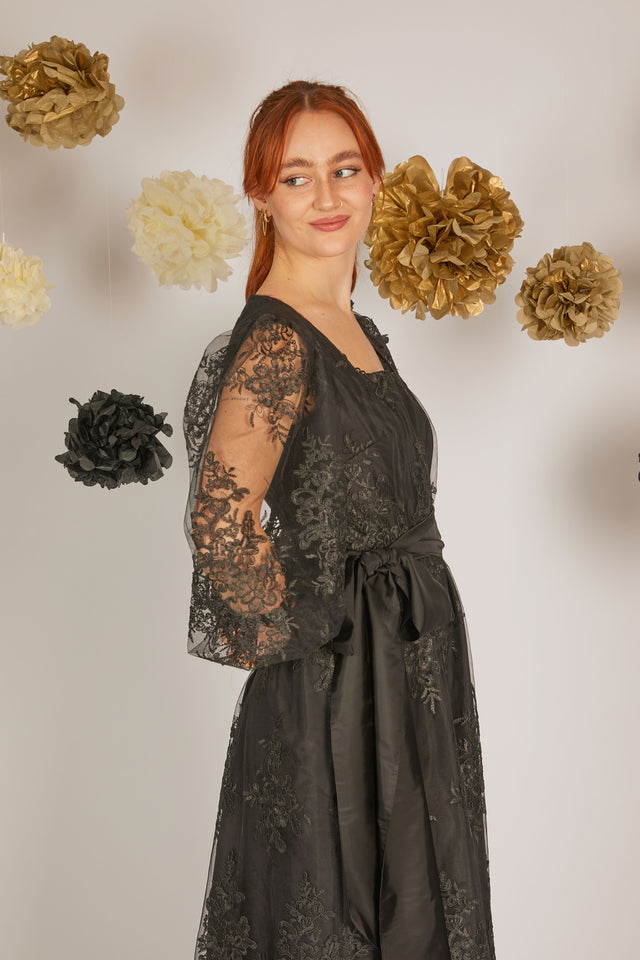 women wearing black lace dress sleeve