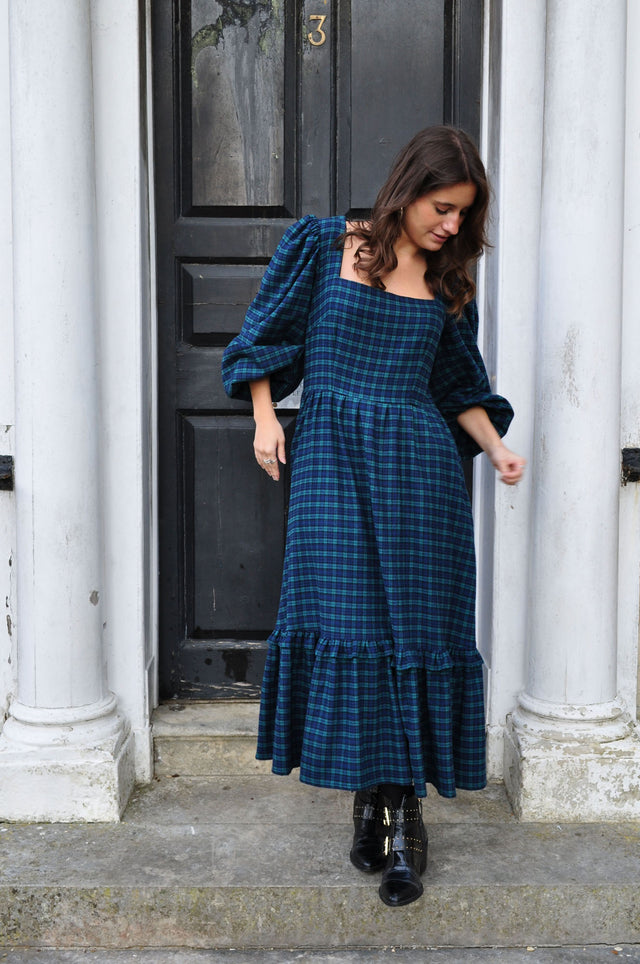 women wearing check dress