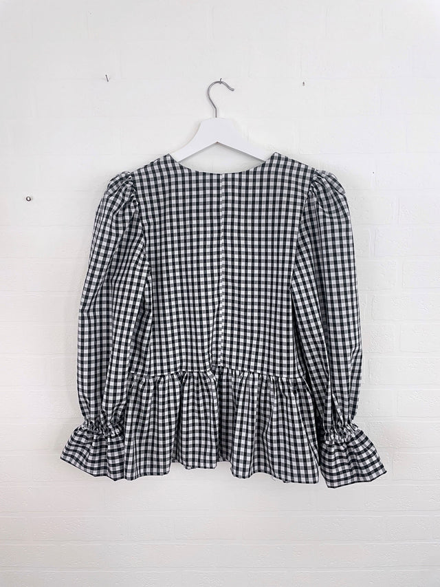 The Well Worn black and white bow top back
