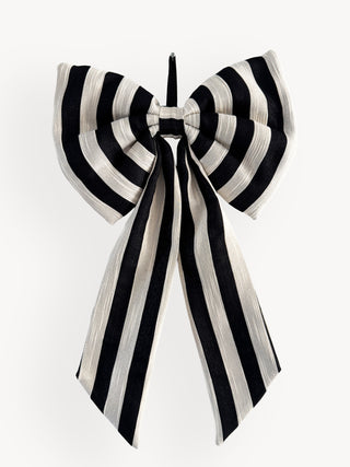 Black and white striped bow on a white background