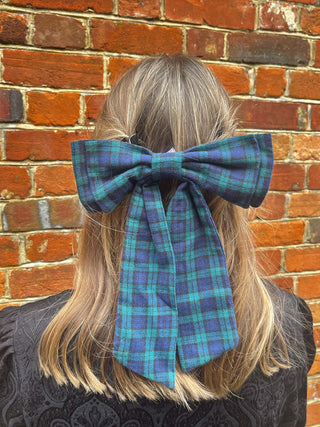 women wearing tartan hair bow