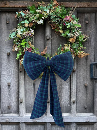 navy check bow on wreath on door