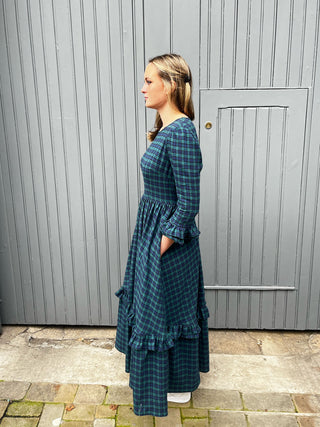 side of women wearing tartan dress