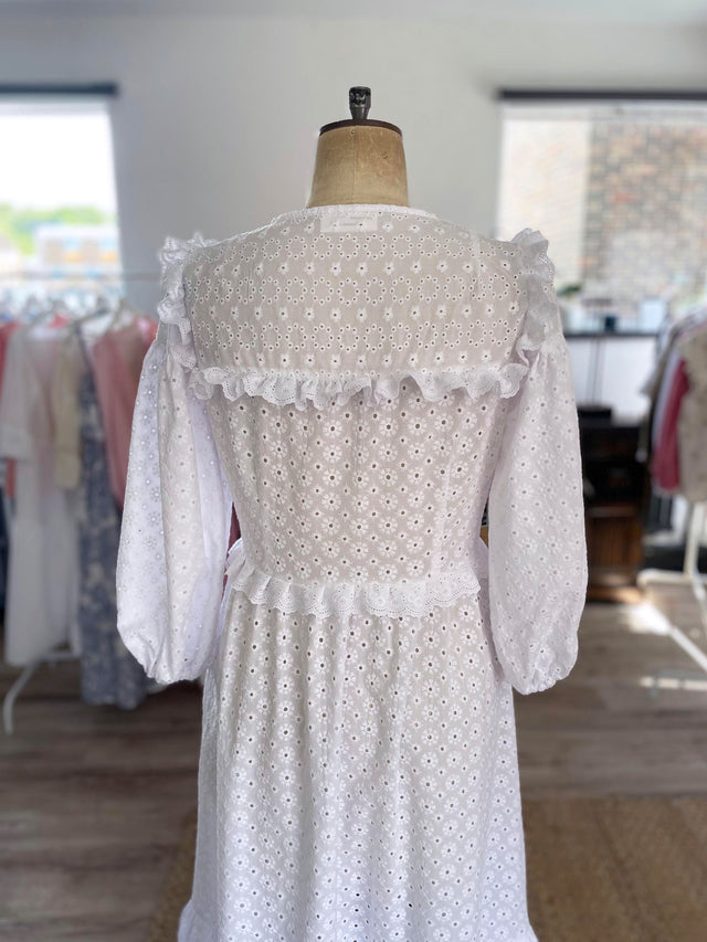 The Well Worn back white broderie dress on mannequin