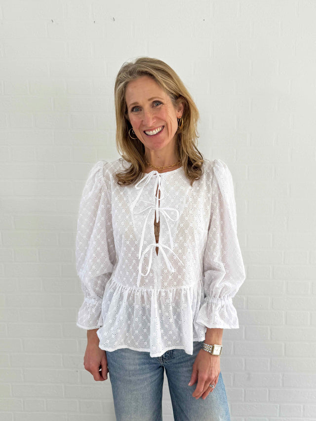 The Well Worn women wearing white broderie top