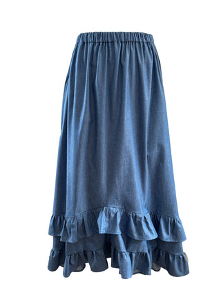 Blue denim skirt with ruffled layers on a white background