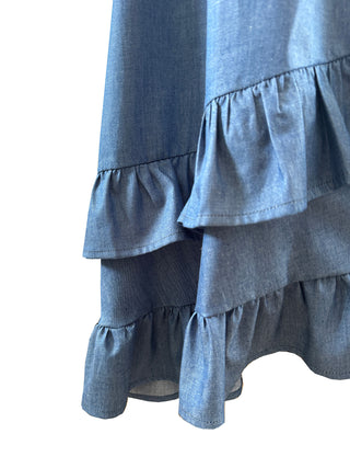 Blue tiered skirt on a white background