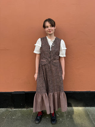 women wearing checked waistcoat