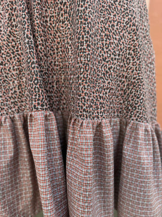 women wearing checked leopard skirt detail