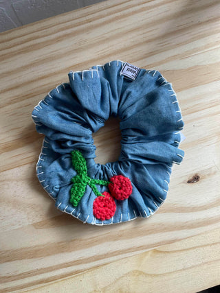 cherry hair scrunchie on shelf