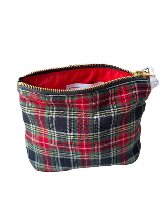 Plaid patterned pouch with a zipper on a white background