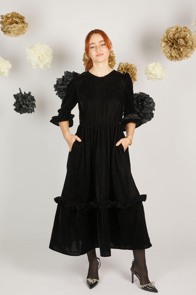 women wearing black velvet dress