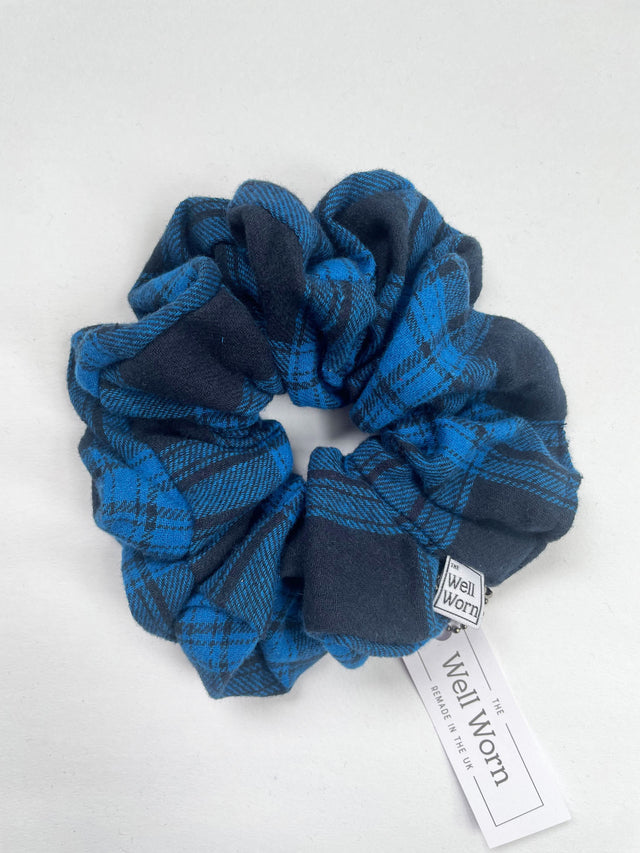 check scrunchie on table blue