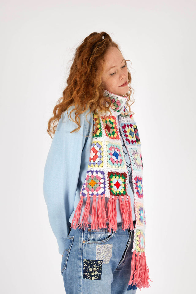 model-wearing-crochet-scarf-looking-down