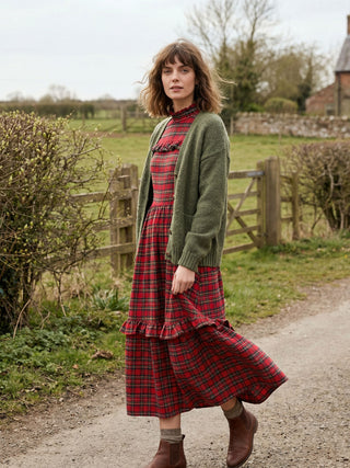 model wearing tartan dress
