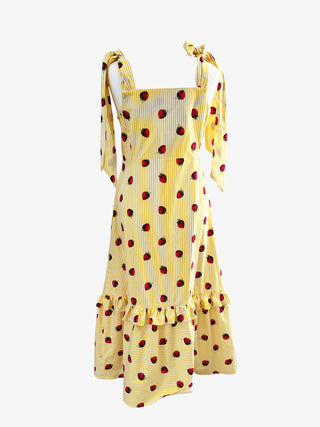 Back view of The Mila Dress – slow fashion summer dress in strawberry print deadstock cotton, ethically made to order by The Well Worn