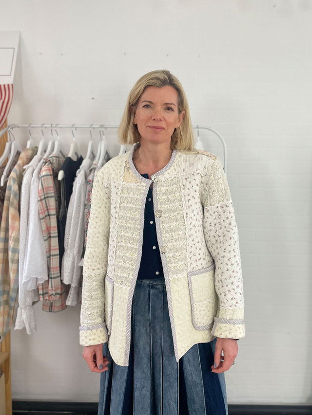The Well Worn model wearing cream quilted jacket