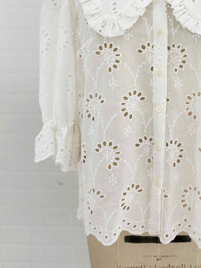 The Well Worn cutwork blouse with scalloped edge hem