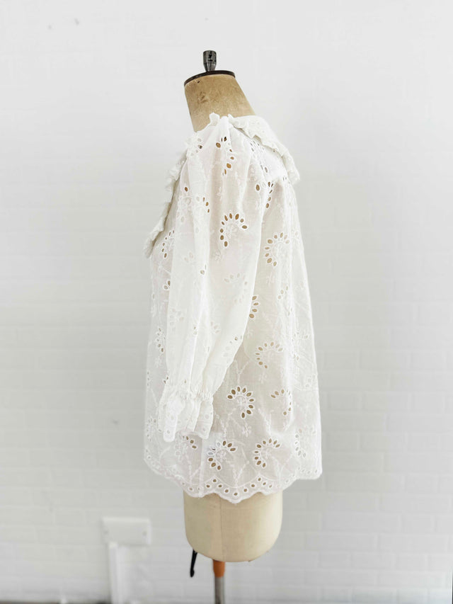 The Well Worn cutwork blouse with scalloped edge side