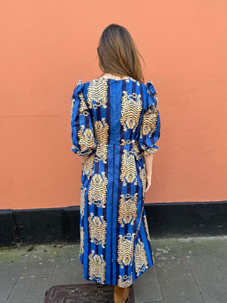 Back view of The Ada Dress showing concealed zip and puff sleeve cuffs, ethically produced in the UK.