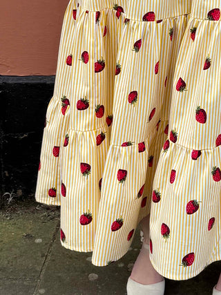 Tiered summer skirt with sweet strawberry pattern and sunny yellow stripes, cra