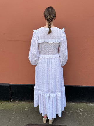 Slow fashion puff sleeve broderie anglaise dress with ruffle details, designed and handmade in the UK