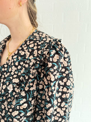 Close-up of The Luna Navy Floral Blouse with oversized collar and vintage buttons.