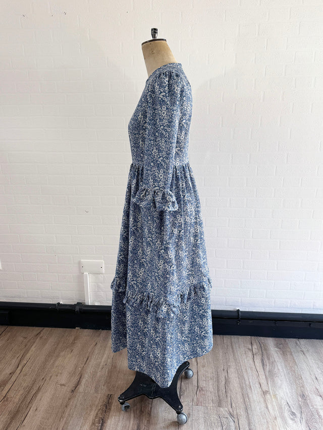 The Well Worn floral dress on mannequin side view