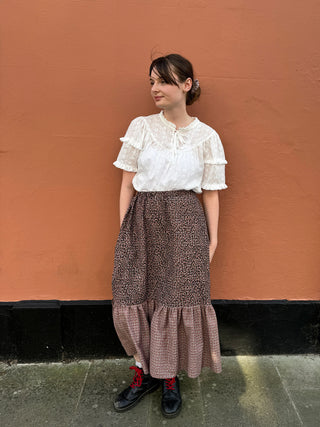 women wearing checked leopard skirt