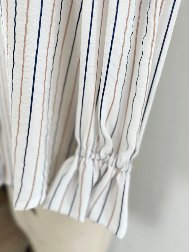 The Well Worn stripe blouse on mannequin cuff detail