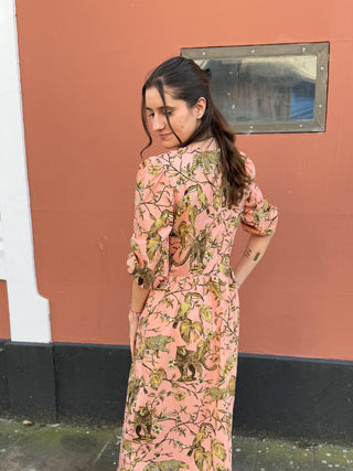 women wearing printed dress back detail