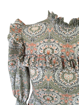 Patterned top with long sleeves on a white background
